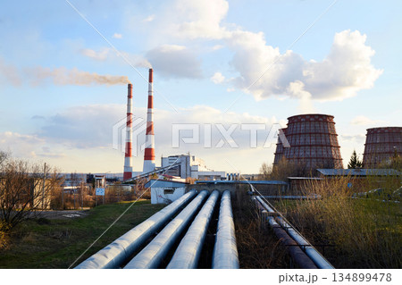 Thermal power plant. Industrial zone. Cooling towers,pipeline,the chimney, industrial buildings. Thermal power plant. Industrial zone. Cooling towers,pipeline,the chimney, industrial buildings. 134899478