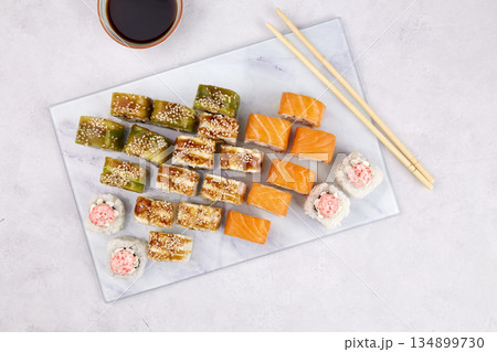 Assorted set of various sushi rolls with tuna, salmon, eel, avocado 134899730