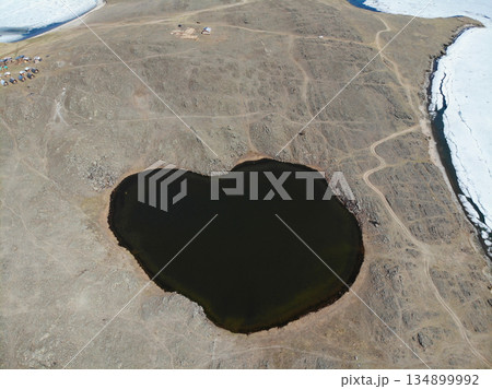 Olkhon Island in spring. Beautiful aerial view of Lake Nuku Nuku Olkhon Island in spring. Beautiful aerial view of Lake Nuku Nuku 134899992