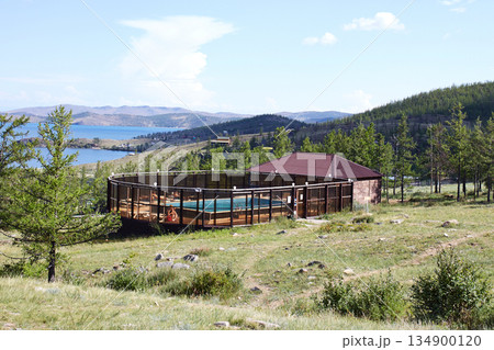 An outdoor swimming pool at a tourist base in a picturesque location 134900120