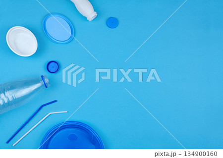 Plastic waste for recycling and reuse on blue background. 134900160