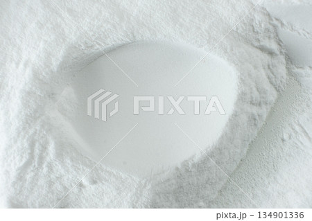 Soda powder sodium bicarbonate surface. Abstract white background with space for text. Soda powder sodium bicarbonate surface. Abstract white background with space for text. 134901336