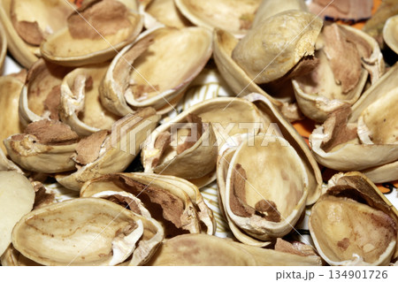 Close up of empty pistachio shells nuts Close up of empty pistachio shells nuts 134901726