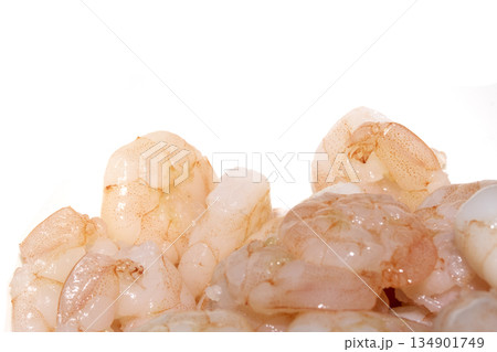 Close up of large cooked prawns pink shrimps on a white background Close up of large cooked prawns pink shrimps on a white background 134901749