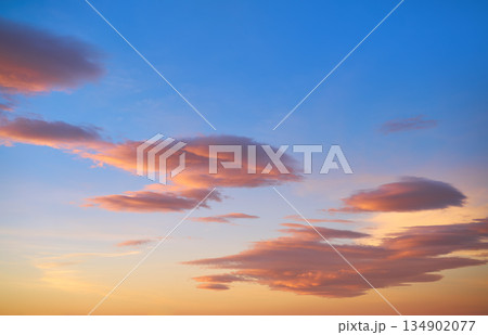 Sunset sky clouds orange and blue Sunset sky clouds orange and blue 134902077