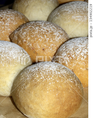 Close up of fresh baked homemade rolls buns breads golden 134902219