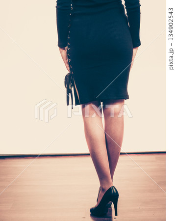 Unrecognizable woman wearing high heels Unrecognizable woman wearing high heels 134902543