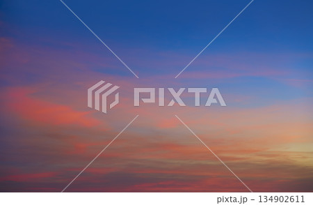 Sunset clouds in orange and blue 134902611