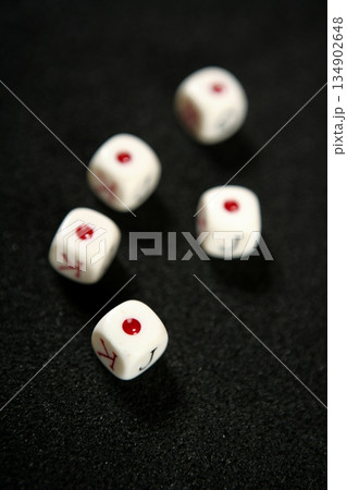 Poker game dices over black table Poker game dices over black table 134902648