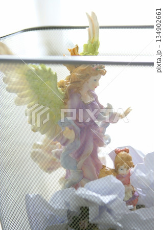 angel saint figure in the office trash angel saint figure in the office trash 134902661
