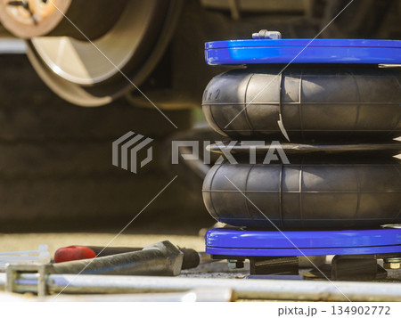 Car in service. Installing air ride suspension. 134902772