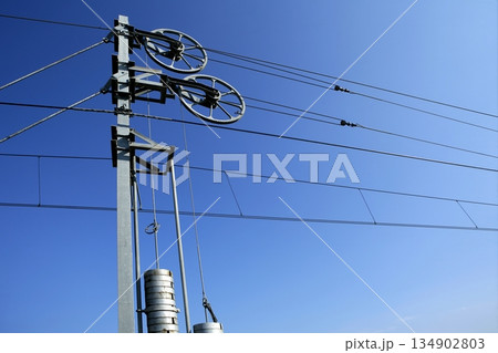 Cables and pole tower, electric train railway 134902803