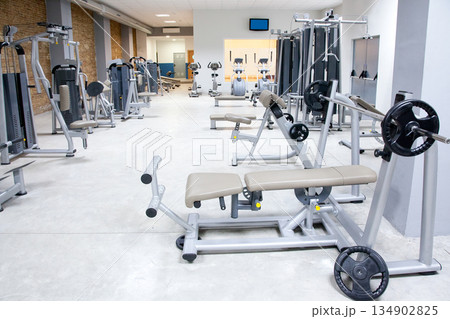 Fitness club gym with sport equipment interior 134902825
