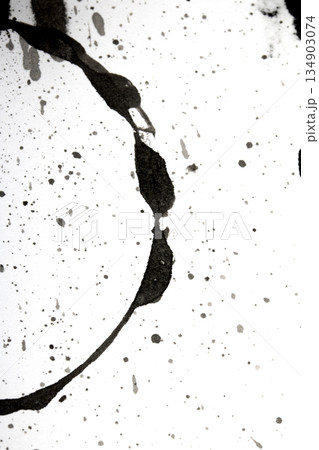 Distressed Monochrome Ink Circle Texture and Splatter Graphic on white background Distressed Monochrome Ink Circle Texture and Splatter Graphic on white background 134903074