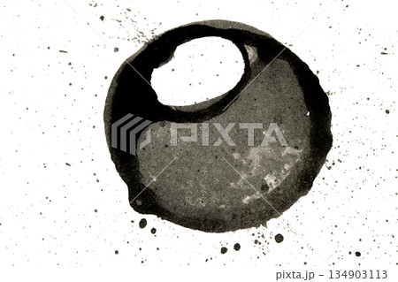 Distressed Monochrome Ink Circle Texture and Splatter Graphic on white background 134903113