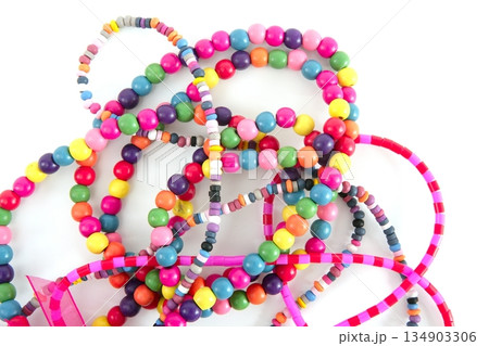 Colorful wood necklaces mess over white Colorful wood necklaces mess over white 134903306