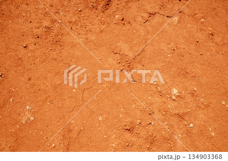 Red soil texture background, dried clay Red soil texture background, dried clay 134903368