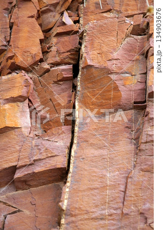 Natural mountain with red rodeno stone Natural mountain with red rodeno stone 134903676