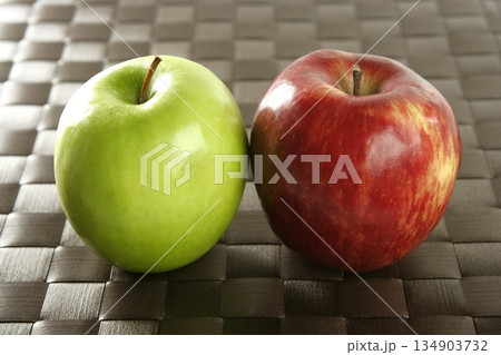apple on a brown tablecloth apple on a brown tablecloth 134903732