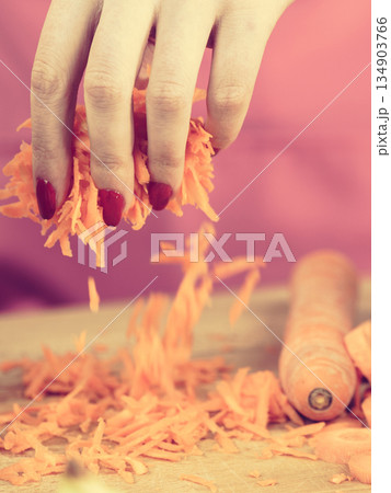 Grated orange carrot for salad 134903766