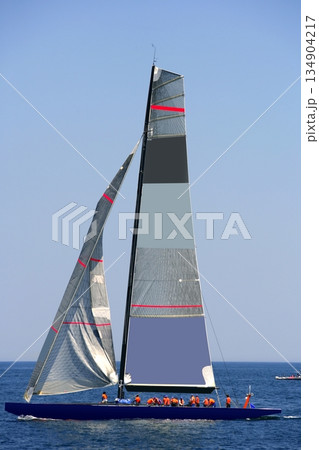 Boat race on Mediterranean water, sailboat 134904217
