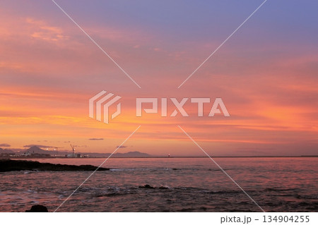 blue and red sunset on beach in Denia Alicante 134904255