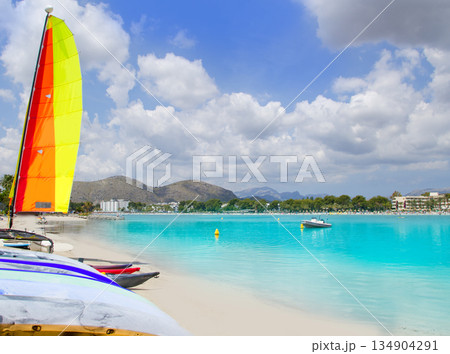 Beach of Puerto de Alcudia in Mallorca with hobie cat Beach of Puerto de Alcudia in Mallorca with hobie cat 134904291
