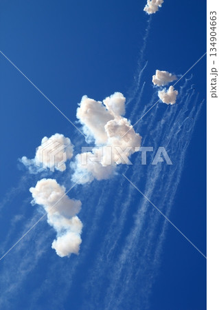 blue sky with fireworks firecrackers white clouds blue sky with fireworks firecrackers white clouds 134904663