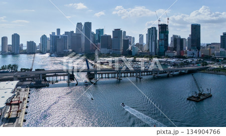 Wide aerial drone view of Miami downtown skyline with bridge over bay Wide aerial drone view of Miami downtown skyline with bridge over bay 134904766