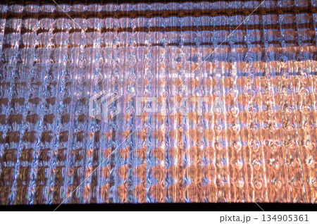 view of the reflections of the rough glass of the entrance of the house view of the reflections of the rough glass of the entrance of the house 134905361