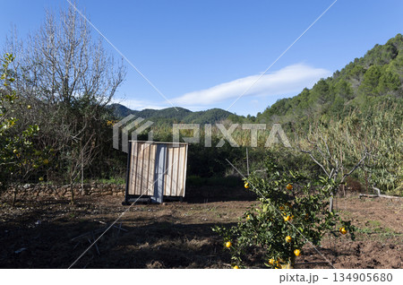 shed constructed of sheet metal and aluminum for storage of farm implements 134905680