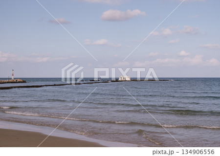 Seaside chapel view with stone path in Georgioupolis Crete Seaside chapel view with stone path in Georgioupolis Crete 134906556
