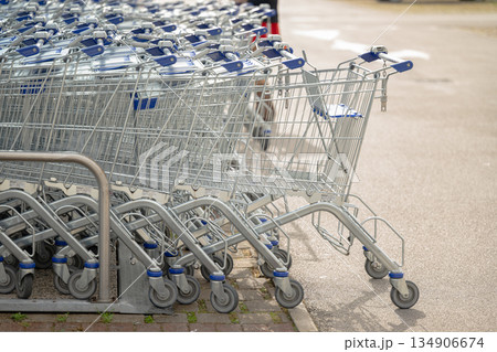 shopping carts in a supermarket shopping carts in a supermarket 134906674