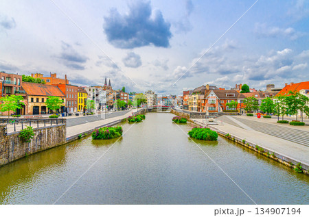 Kortrijk cityscape with promenade of Lys river, bridge across Leie river 134907194