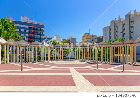 Placa Major Plaza Mayor Main square with colonnade columns in old town Calpe city historical centre in sunny summer day, Calp Casco Antiguo, province of Alicante, Valencian Community, Spain Placa Major Plaza Mayor Main square with colonnade columns in old town Calpe city historical centre in sunny summer day, Calp Casco Antiguo, province of Alicante, Valencian Community, Spain 134907546