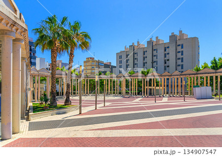 Placa Major Plaza Mayor Main square with colonnade columns and palm trees in old town Calpe city historical centre in sunny day, Calp Casco Antiguo, province of Alicante, Valencian Community, Spain Placa Major Plaza Mayor Main square with colonnade columns and palm trees in old town Calpe city historical centre in sunny day, Calp Casco Antiguo, province of Alicante, Valencian Community, Spain 134907547