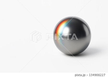 A metal ball with a rainbow reflection. Space for text. 134908227