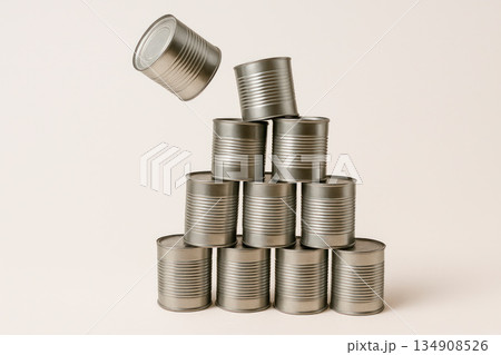 A pyramid of cans. Space for text. A pyramid of cans. Space for text. 134908526
