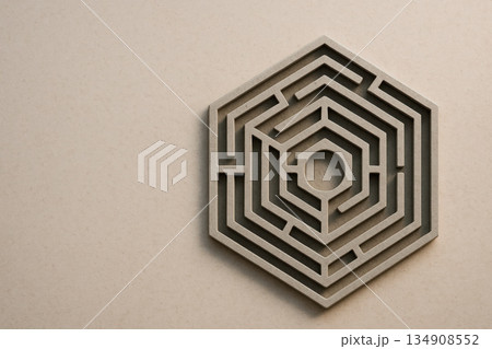 Hexagonal labyrinth on a light background. Space for text. 134908552