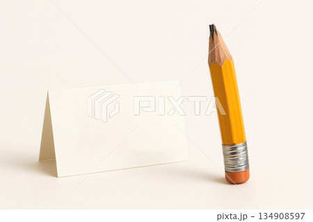 A broken pencil next to a sign sign. Space for text. 134908597