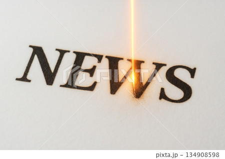 The inscription NEWS is burned with a laser. Space for text. The inscription NEWS is burned with a laser. Space for text. 134908598