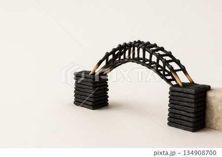 A bridge made of burnt matches between stone piers. Space for text. A bridge made of burnt matches between stone piers. Space for text. 134908700