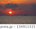 Sunrise in the morning at Saphanhin public beach, Phuket, Thailand. 134911315