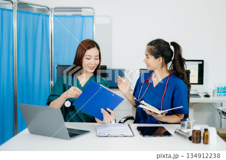 doctors and nurses working together in a modern office, showcasing healthcare teamwork, consultation, and professional care 134912238