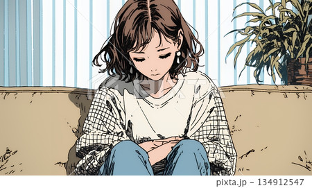 腹痛（生理痛）に苦しむ若い女性 134912547