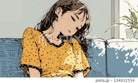 腹痛（生理痛）に苦しむ若い女性