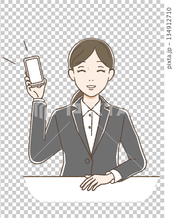 一位身穿西裝的女子麵帶微笑,展示著她的智慧型手機螢幕和上半身。 一位身穿西裝的女子麵帶微笑,展示著她的智慧型手機螢幕和上半身。 134912710