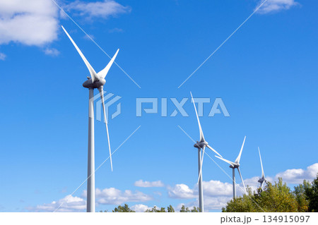 Windmill with huge blades and blue sky of the country Windmill with huge blades and blue sky of the country 134915097