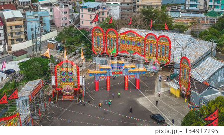 Dec 20 2025 Colorful Festival Arch Over Busy Street, Kam Tin Jiao Festival Dec 20 2025 Colorful Festival Arch Over Busy Street, Kam Tin Jiao Festival 134917295