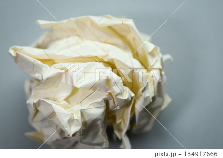 round lump paper on grey background, recycle used paper round lump paper on grey background, recycle used paper 134917666